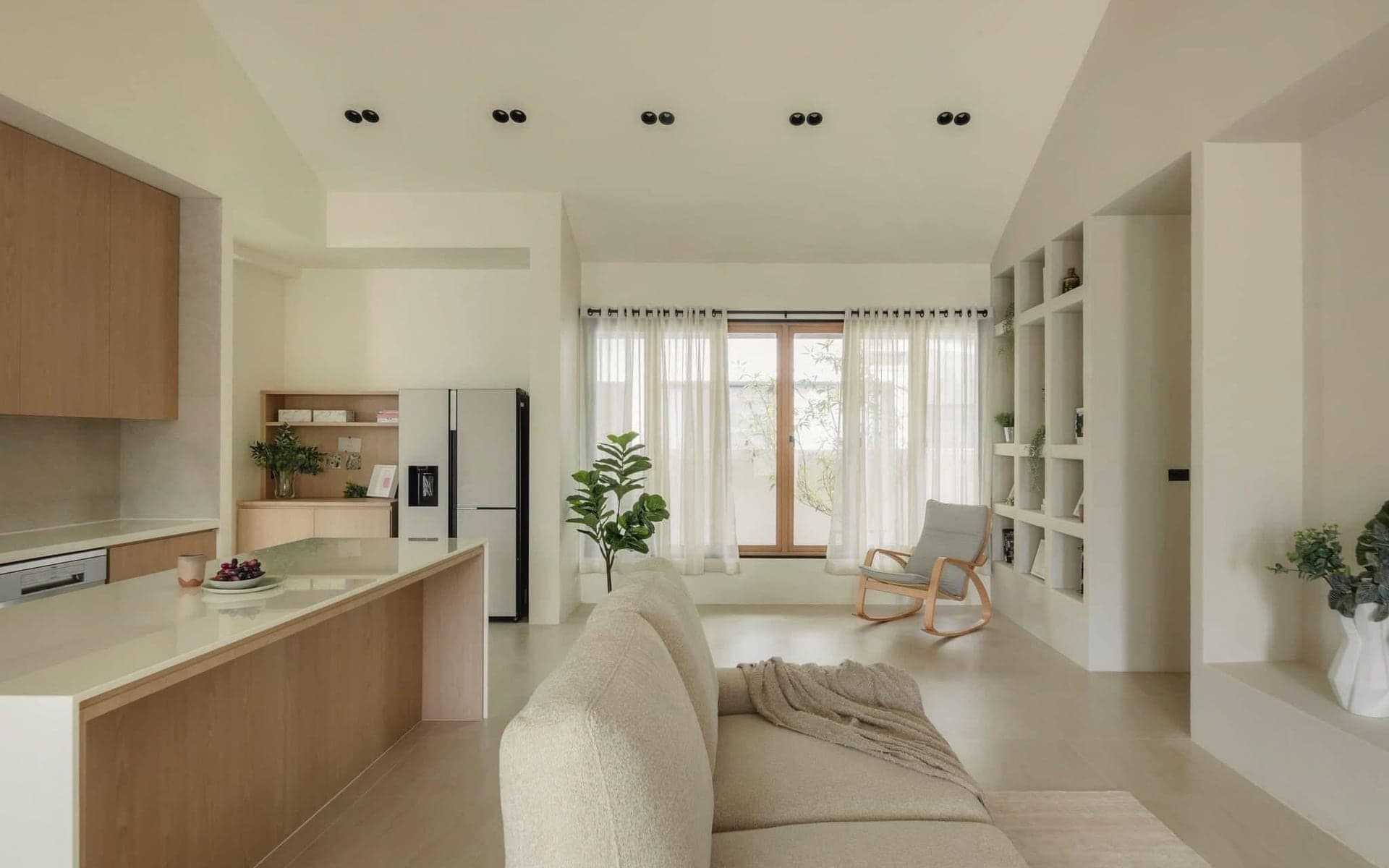 Completed landed home interior with open living and kitchen planning